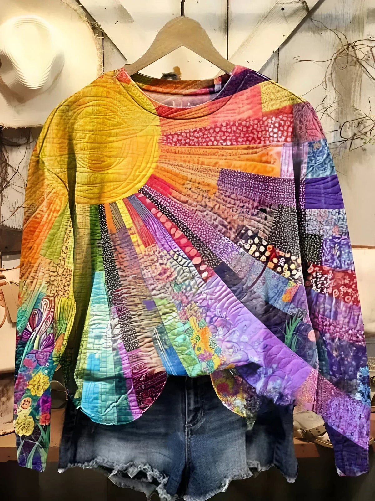 DELACROIX | Trui Brigitte met zonnenprint en patchwork